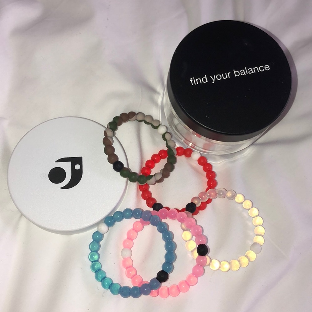 5 Lokai Bracelets .